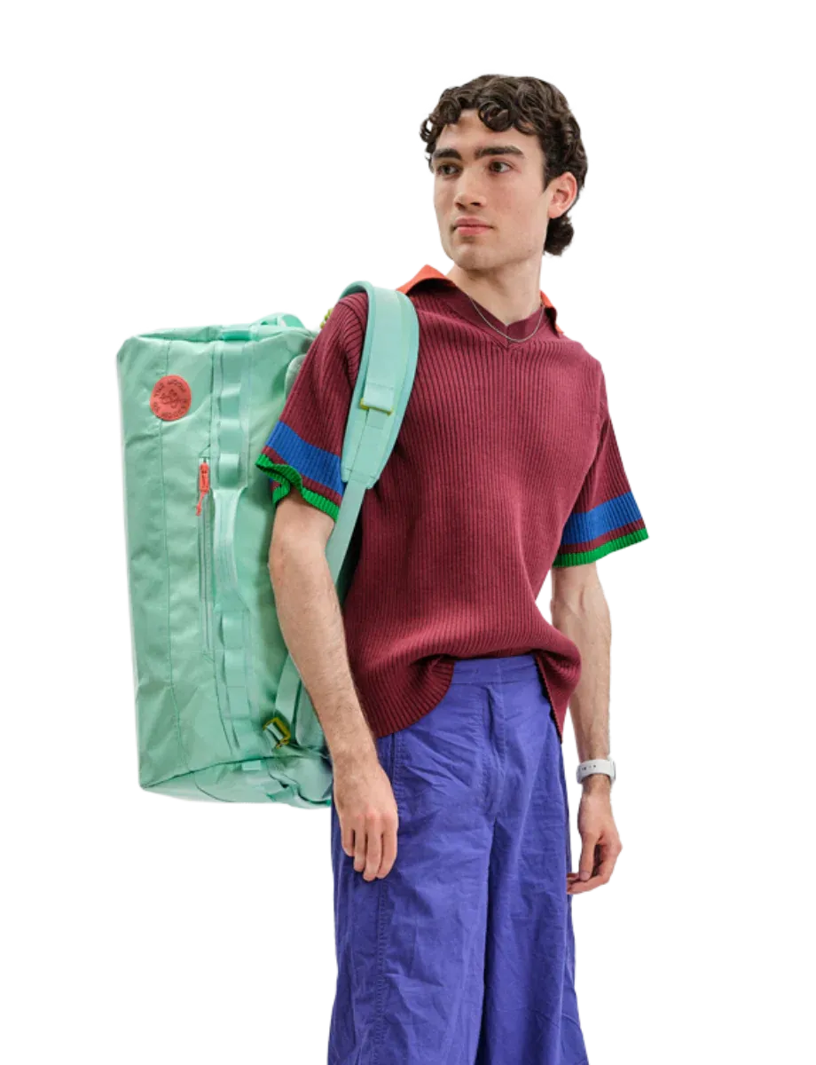 Lachlan with bag slung over shoulder