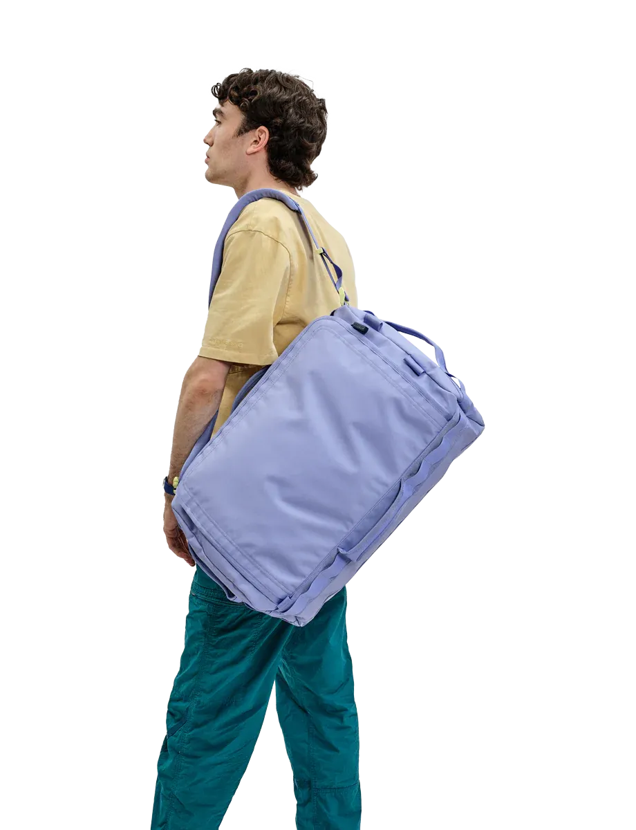 Lachlan with bag slung back